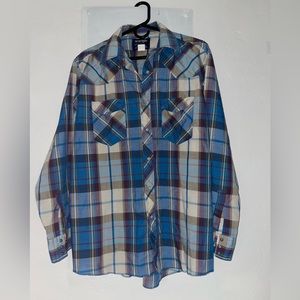 Wrangler cowboy cut. Regular fit. X-long tails. Pear snaps.